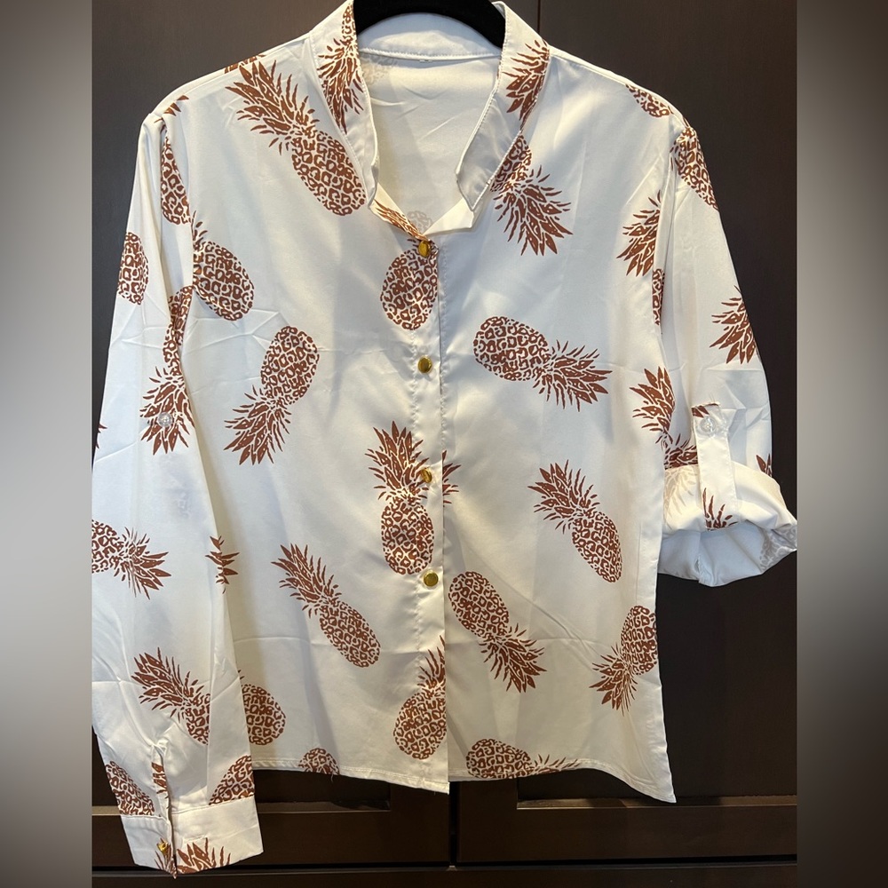 Pineapple blouse white with tan print size medium.